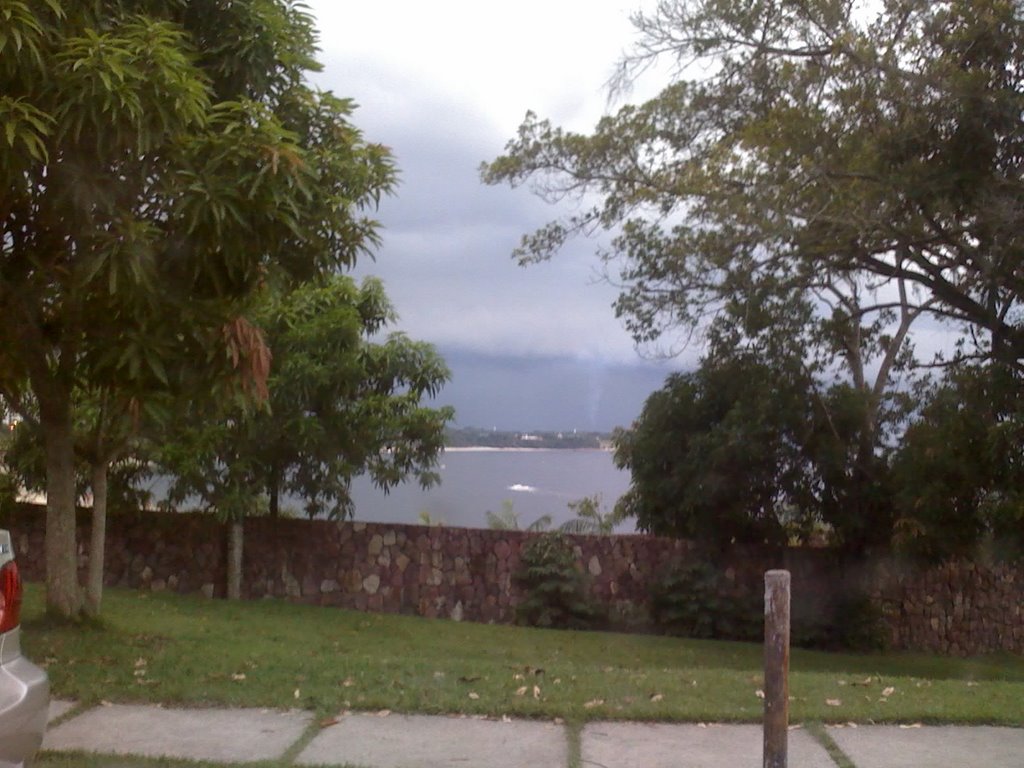 LITTLE TORNADO OVER MANAUS CITY.YOU CAN SEE BETWEEN THE TREES, AMAZON,BRAZIL,OCTOBER 2007- PEQUENO TORNADO SOBRE A CIDADE DE MANAUS, PODE-SE VÊ-LO ENTRE AS ARVORES, AMAZONAS, BRASIL, AGOSTO DE 2007 by JOSUÉ FERREIRA