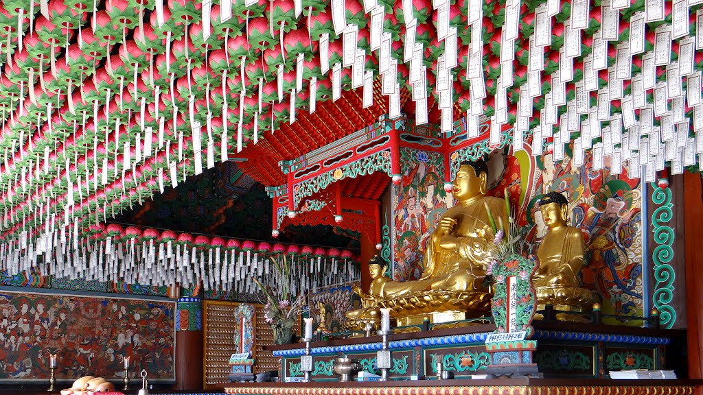 Yongmunsa Daeungjeon is the main worship hall at the temple. On the main altar is a triad of statues with the much larger Birojanabul (Buddha of Cosmic Energy) in the middle - Yongmunsa (temple) meaning “Dragon Gate Temple,” in Yecheon was established in 870CE by monk Duun. by steve46814