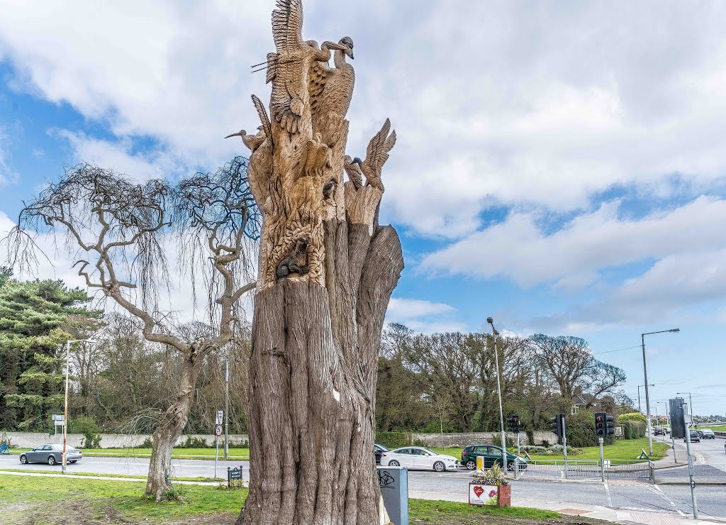 FOR A BETTER WAY TO RE-CYCLE OLD TREES CALL TOMMY CRAGGS THE TREE SCULPTOR by William Murphy