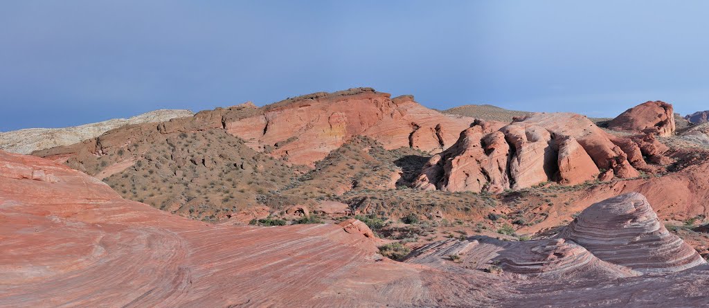 Aztec sandstone makes up the Fire Wave with a cap of Overton Conglomerate. by John Roberts