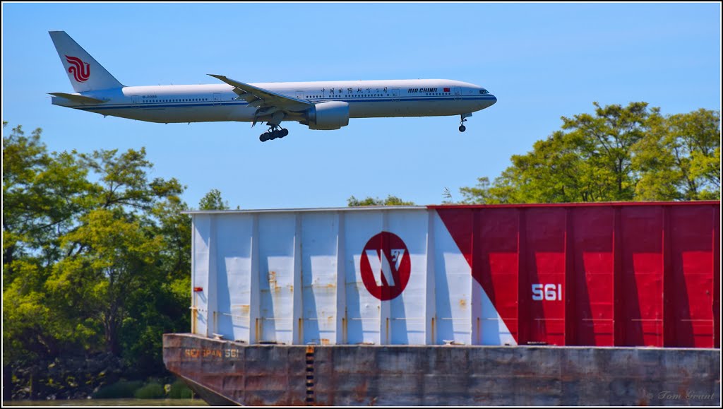 Air China B777 landing YVR 26R - May 2016 Photo'd from Milltown Bar & Grill patio by ThosGee