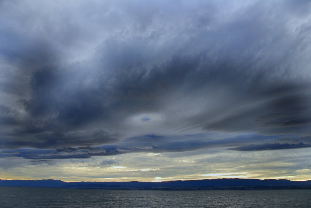 Cloudy sunset at Lac Leman - Switzerland by Rakan Alireza