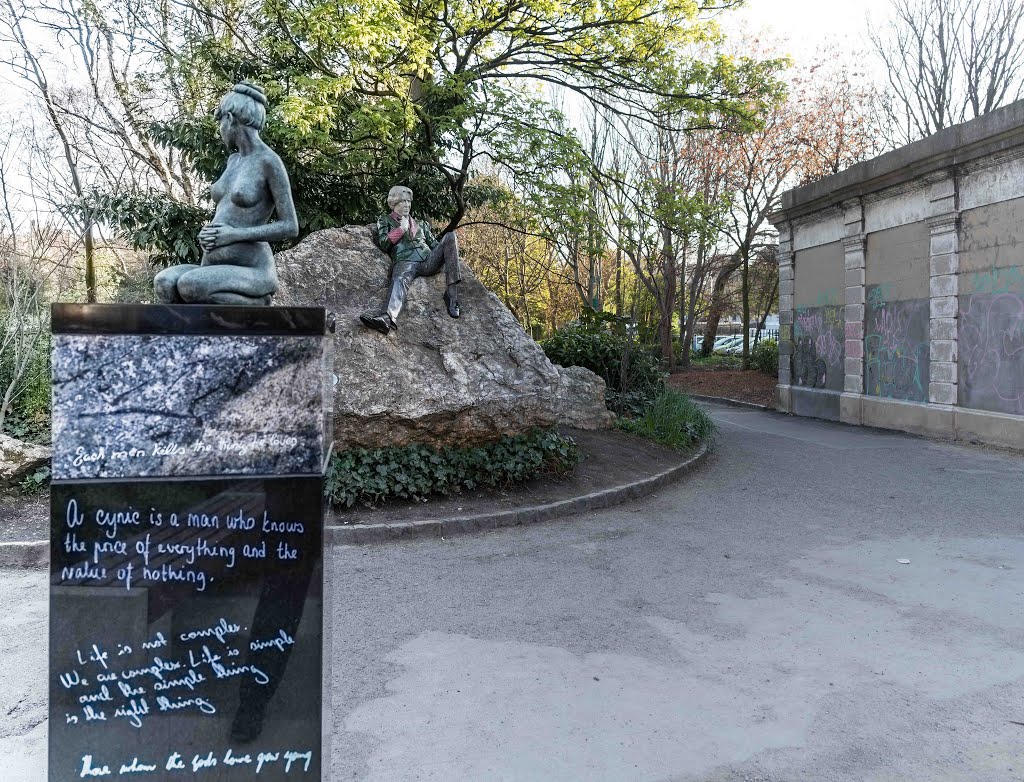 THE OSCAR WILDE INSTALLATION HAS BEEN RESTORED AND REPAIRED AND THE LAYOUT HAS BEEN CORRECTED [MERRION SQUARE DUBLIN] by William Murphy