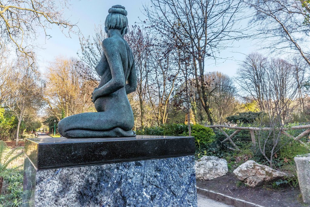 THE OSCAR WILDE INSTALLATION HAS BEEN RESTORED AND REPAIRED AND THE LAYOUT HAS BEEN CORRECTED [MERRION SQUARE DUBLIN] by William Murphy