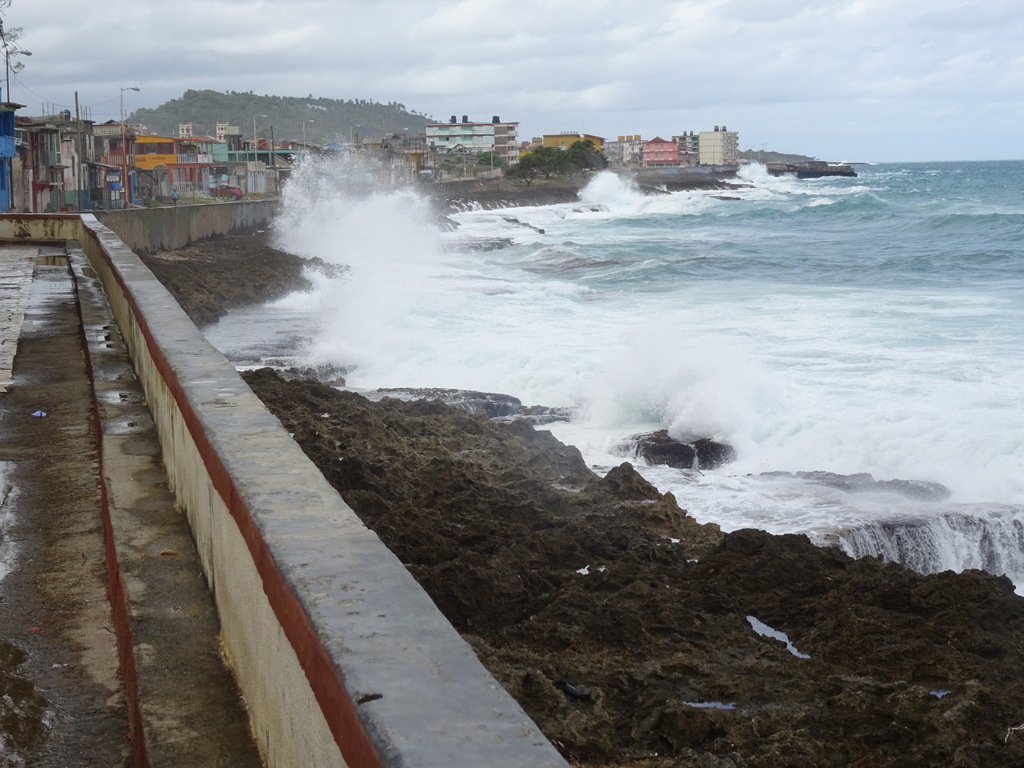 Baracoa beach front by Warwick Sellens