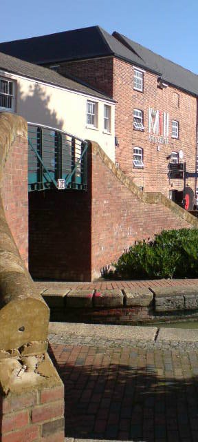 The Mill Arts Centre in Banbury, viewed from across the Canal by puppeteer.tv