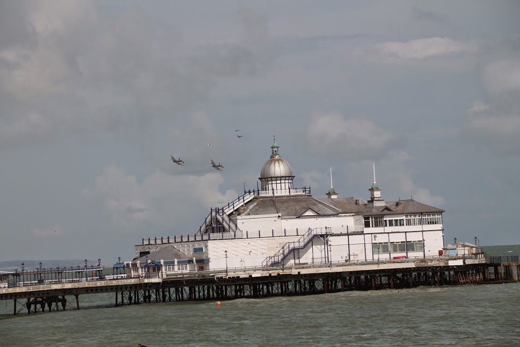 Two Lancaster bombers one Spitfire and Hurrican eascorts ,say goodbye to Eastbourne by Peter James