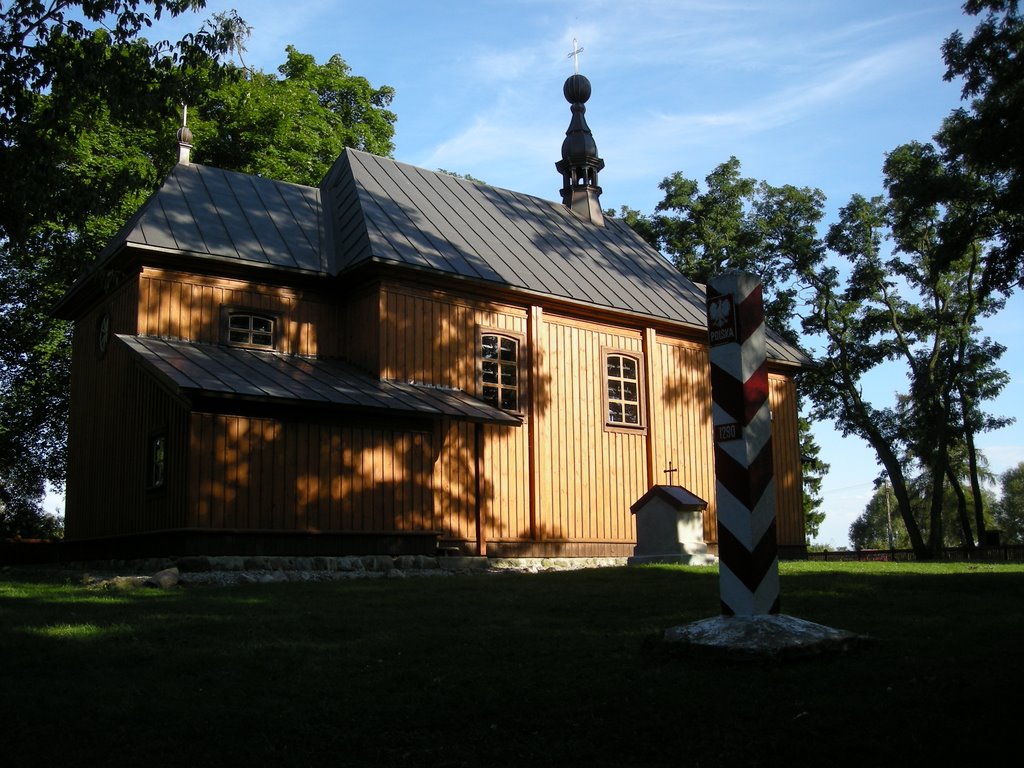 KRZYCZEW. Wooden catholic church (former orthodox) after renovation. by Maciek Pawłowski