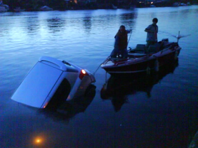 Car in Thames Near Anglers Pub, Walton by twisted_eddie