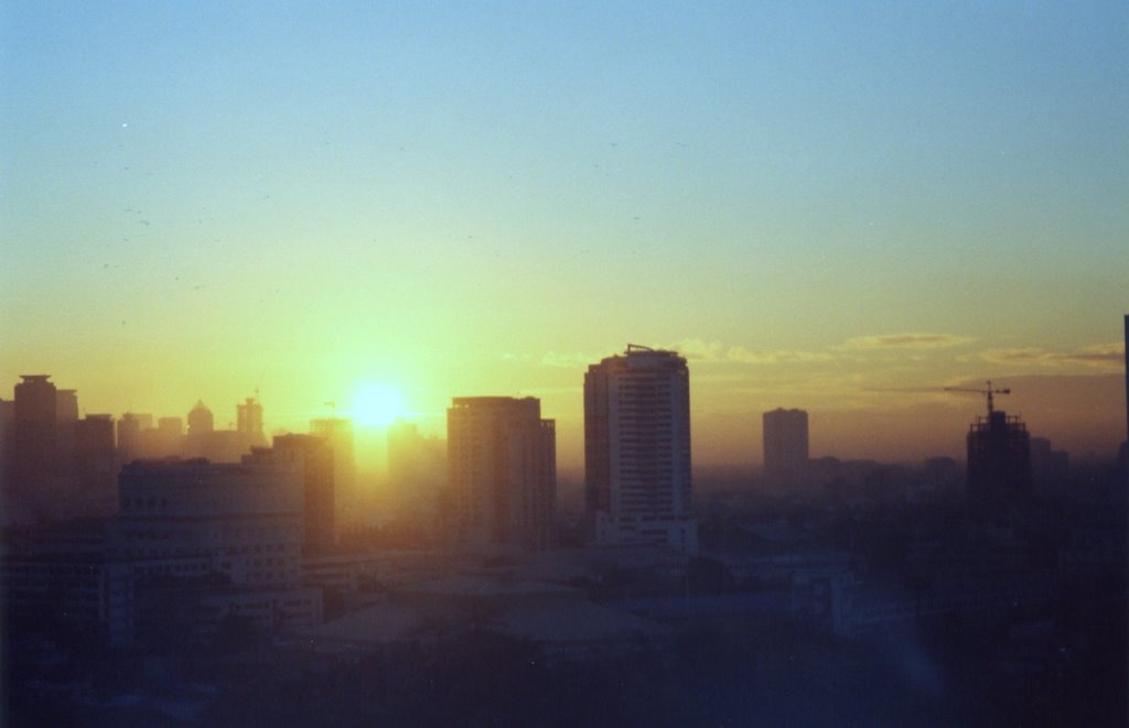 Sunrise from Makati city by Phoenixjhs