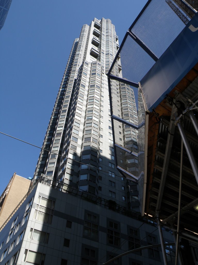 Building Reaching The Sky In Manhattan, New York. by MrNAASSIR