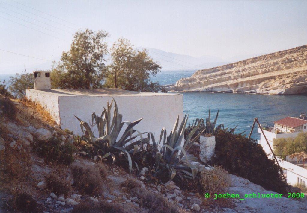 House at the edge of matala_crete_08_2004 by jochen_schlueter