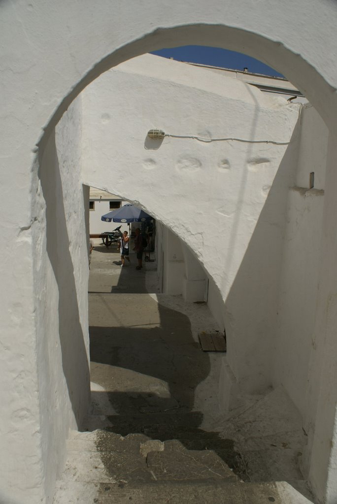 White and narrow streets of Panormitis by Emre Zaim