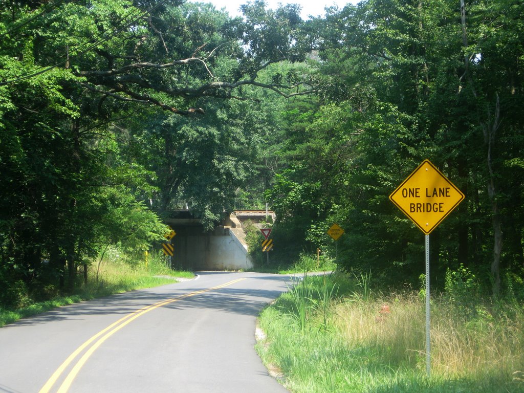 Furnace Rd heading under the railroad tracks by Idawriter