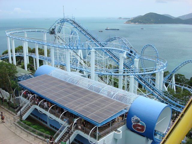 The roller coaster (the Dragon) station- looking from the Ferris wheel by Justin Zhu