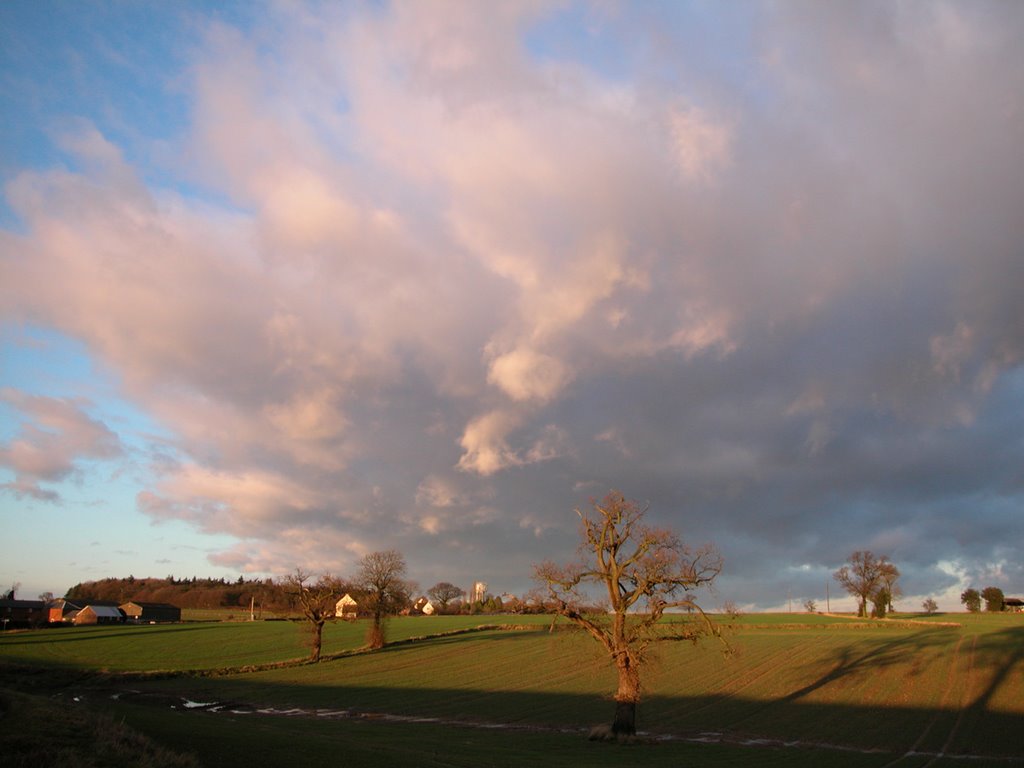 Sunlit clouds over Tea Green by Geoff Spivey