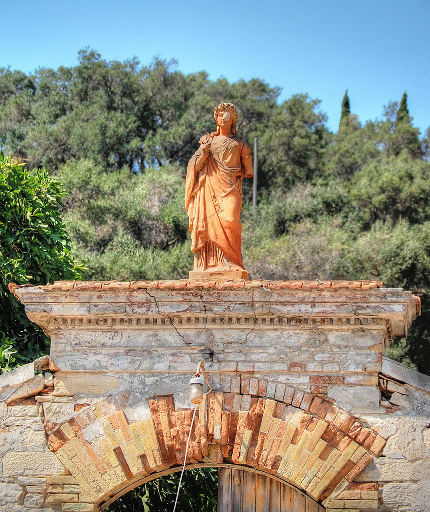 Little statue on the old chalk factory entry, Longos Paxos by m@rtym@n