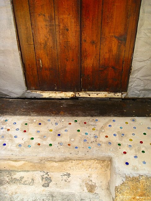 A decorative doorstep in the old fishing village of Tai O, Hong Kong. by Kiri T