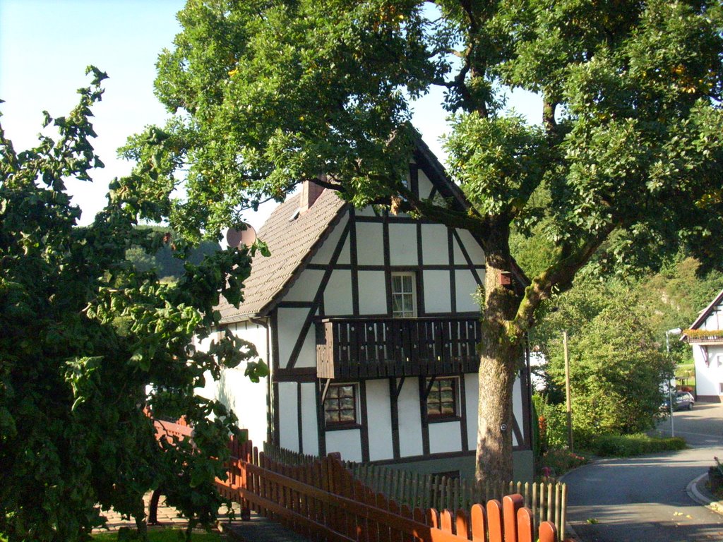 Hülschotten am Kirchplatz by Werner Riggers