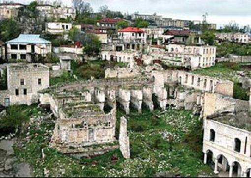 Shusha-Azerbaijan. "Meydan" quarter. The view of the ruined buildings of Agha Qakhraman Mirsiyab caravanserai from the minaret of the Upper Govhar Agha mosque. An architectural monument of the middle 19th century. After the occupation. by Idris-Guba