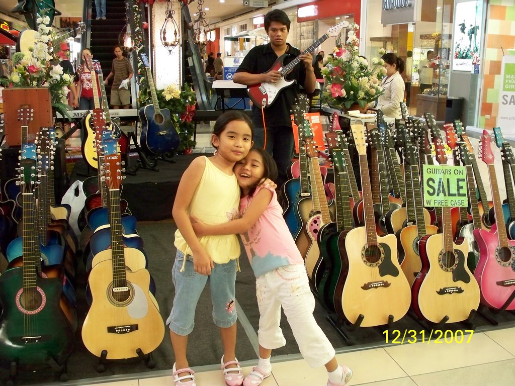 Guitar Sale inside SM Bcld by kang © francis b i ♣