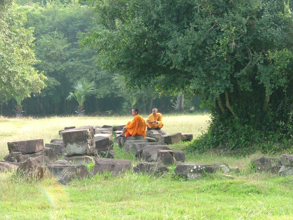 Monks near angkor wat by yaniv ronen