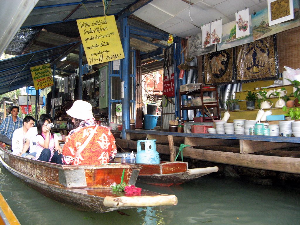 Stalls at Dumnoem Saduak Floating Market Thailand by J Roskilly