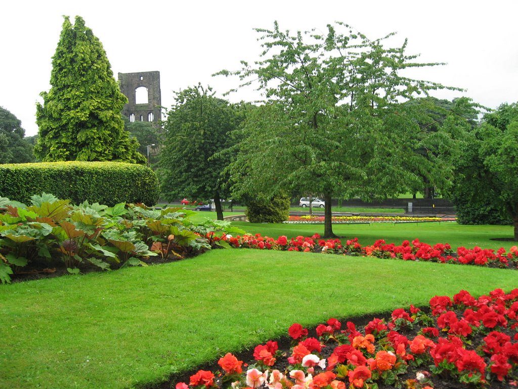 Gardens of the Abbey House Museum with the ruins of Kirkstall Abbey in the background, Leeds by G.M. Kowalewska