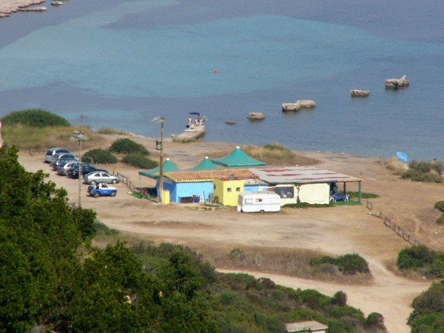 Capo Comino - Bar spiaggia dalle casette del posto vedette by ilnani