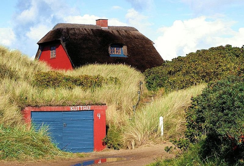 Home at Henne Strand. by Grzegorz Krzywoszyński