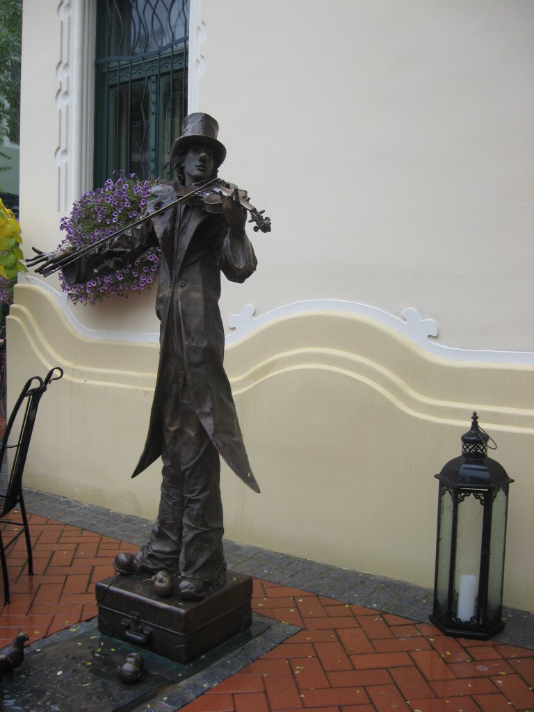 Subotica -Raichle Palace-Backyard -The Violin player (Sculptor Sandor Kligl) by Sonja Sofronić