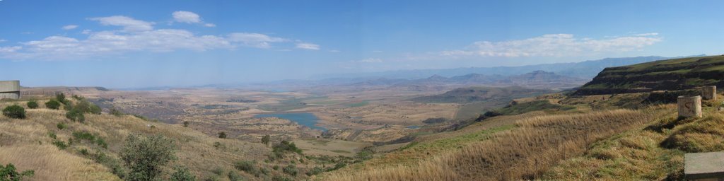 View from top of Oliviers Hoek Pass into KwaZulu-Natal. Taken from near the Sterkfontein Dam one of several dams comprising the Drakensberg Pump Storage System. Kilburn Dam in foreground and Woodstock Dam in far distance by John A Forbes