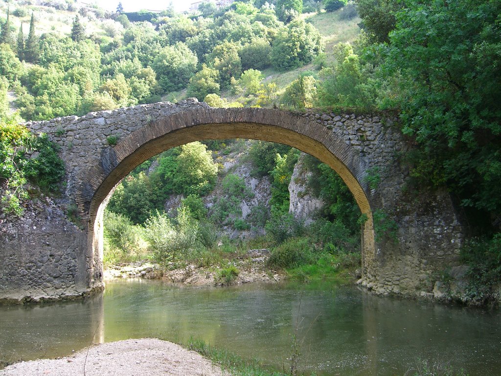 Old roman bridge in summer by umberto sebastiani