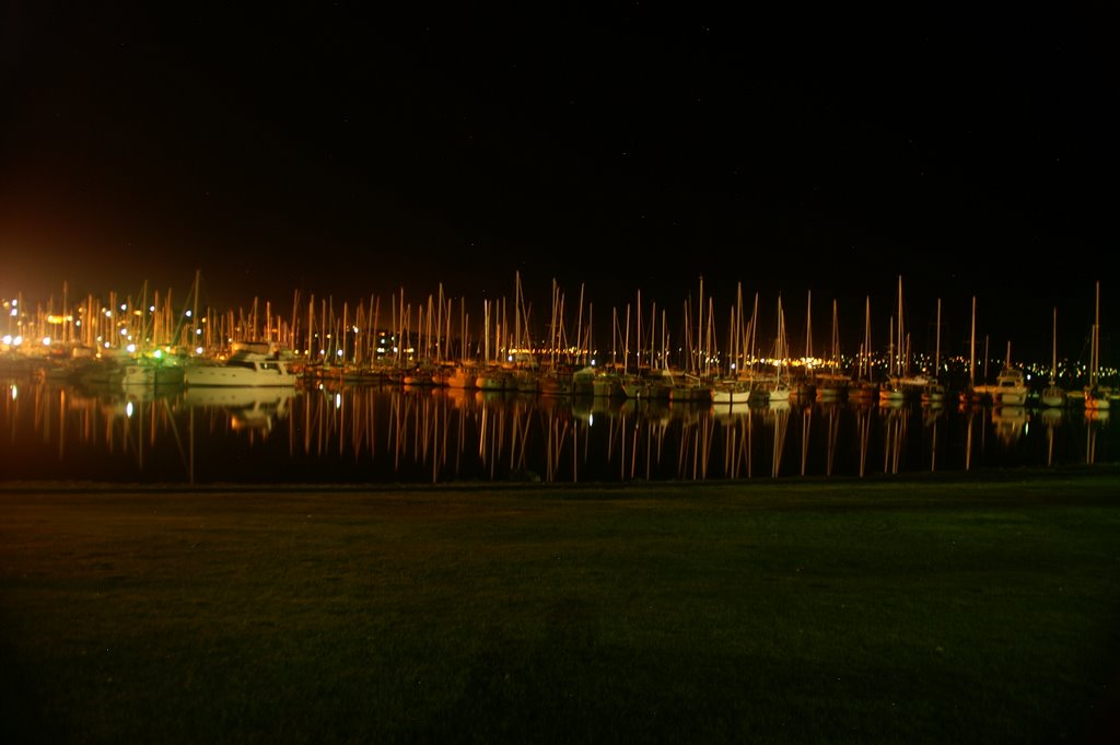 A night view of the yatchs moored near Wrest Point by Andrew Gilbett