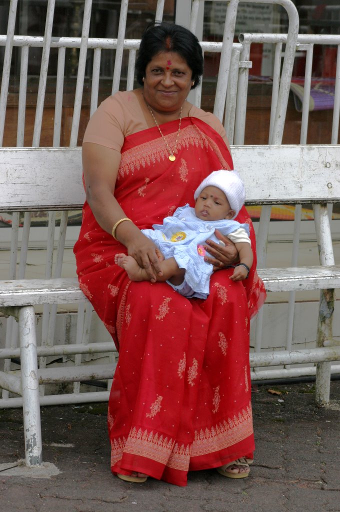 Grand Bassin - Hindu woman with baby by Jan Madaras - outlan…