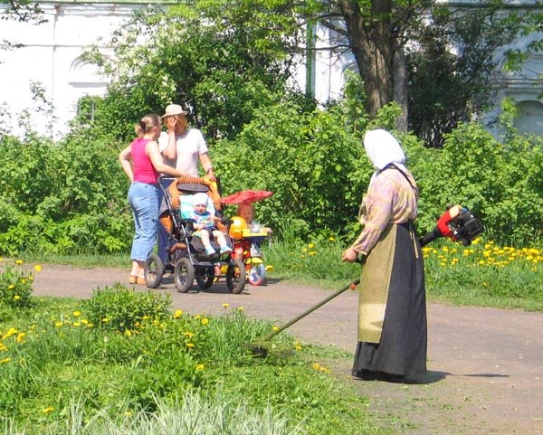 Nun at Alexandrov Kremlin by Jason Conrad