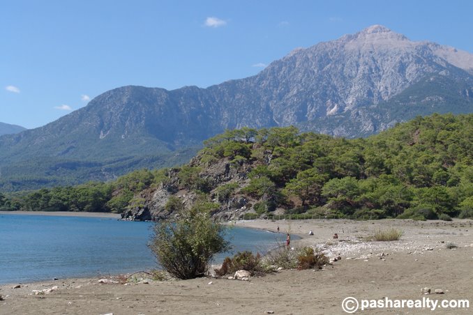 Shallow harbour with Mt. Olympos backdrop at Phaselis by pashatech