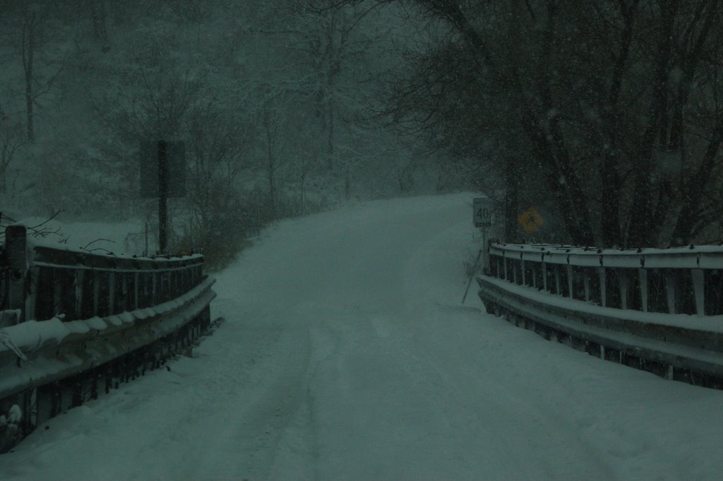 Snow covered bridge by jimwithajeep