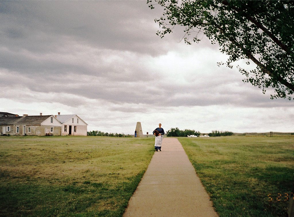 Woman walking at Ft. Laramie by Randy Colby