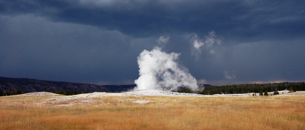 Old faithful in thunderstorm by brien chartier