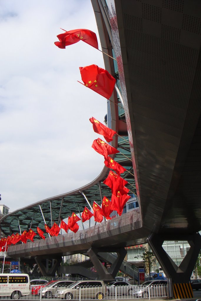 Red flag fluttering by Huajun Wang