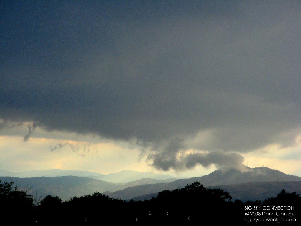 2008 - August 11th - 00:32Z - Looking WSW - Wall cloud breaks up with topographical interaction. by Dann Cianca