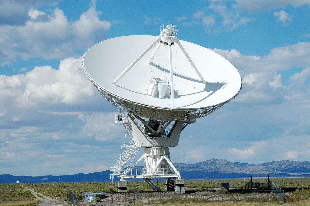 A VLA telescope next to Highway 60. It moved from facing to the West to the South when I was standing there, the whole array moved at the same time. by Valkyrie Rider