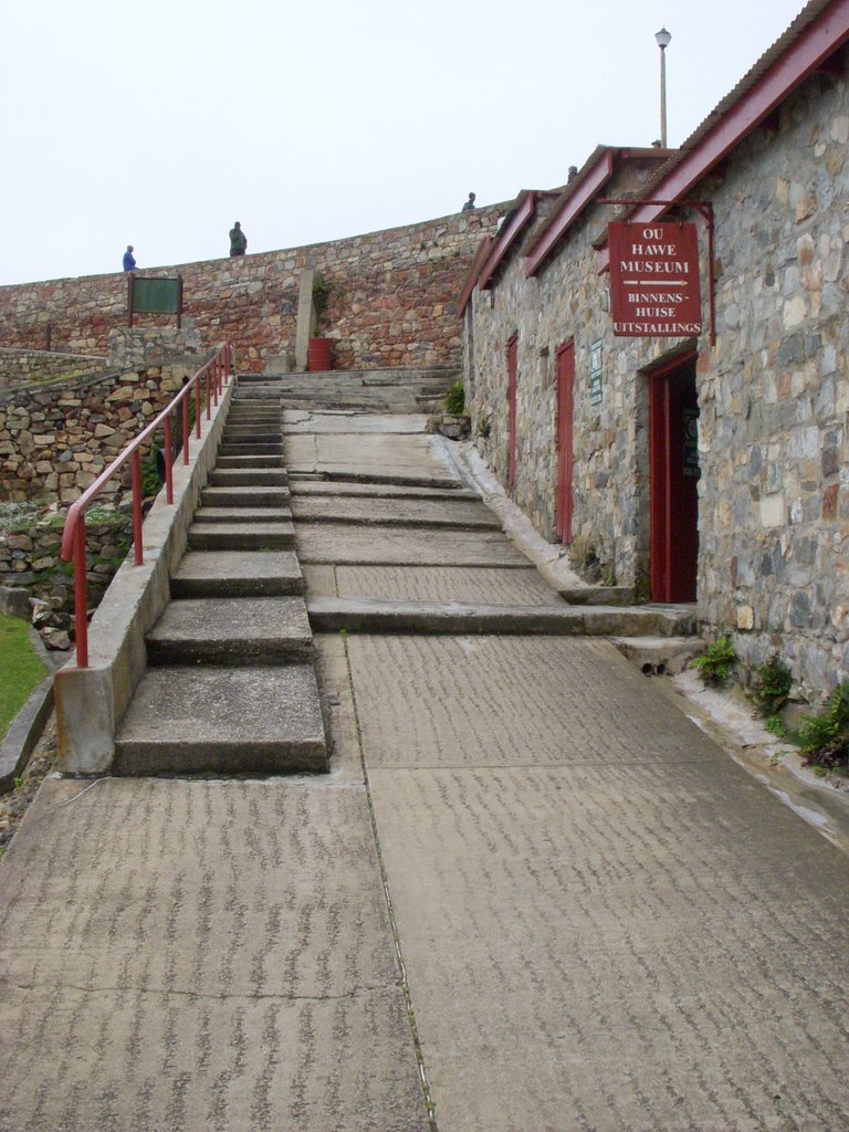 Harbour museum on right, step up out of harbour by Charles Vrey