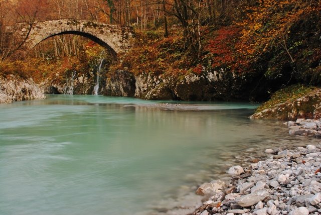 Ancient bridge over Nadiža River by Samo Trebizan