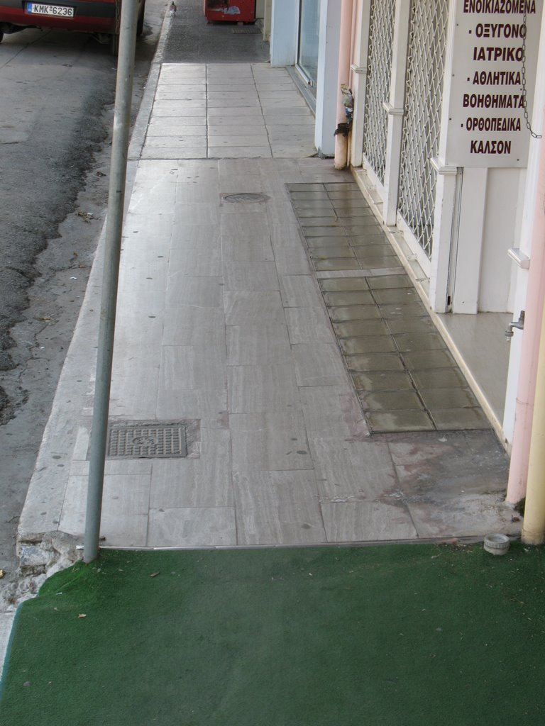 Diversity of sidewalk paving in Kalamata by macrolepis