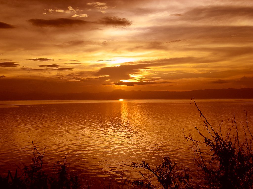 Sunset over Tanon Strait from Barili Cebu by peter harder