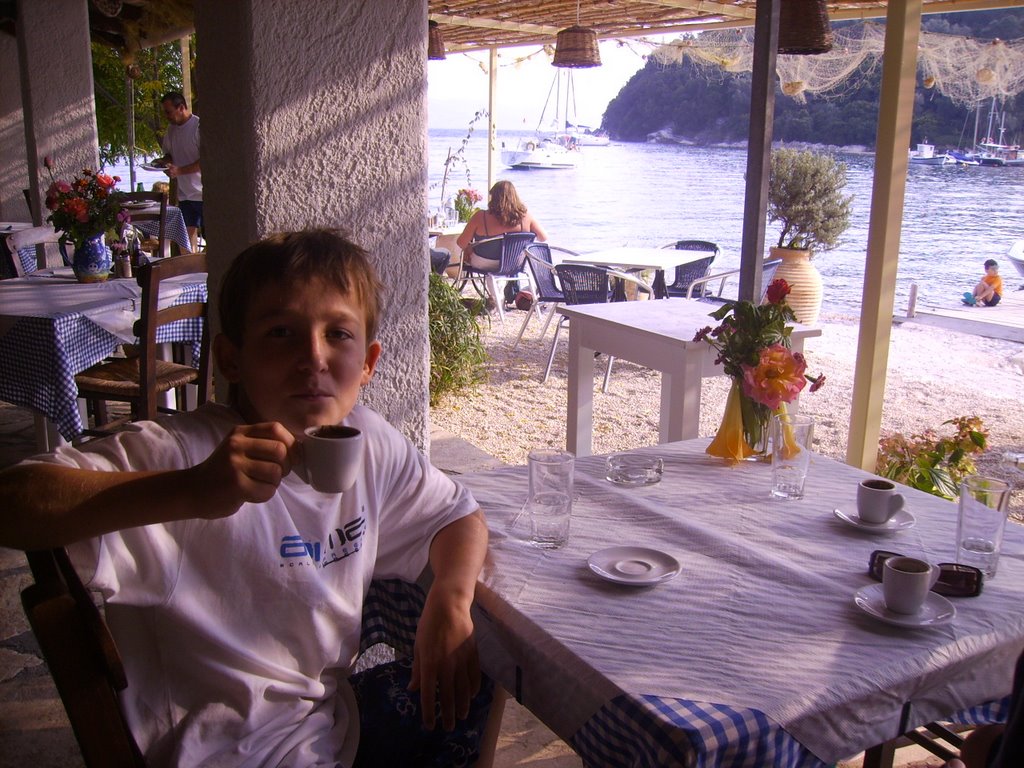 Max trying the coffee in agios stephanos by suebaker