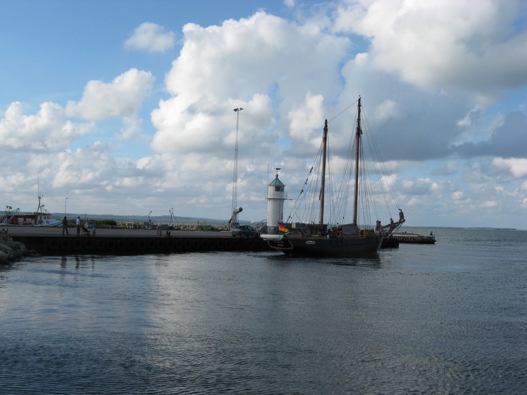 Sailboat sailing past Aarøsund Lighthouse by krungadoren