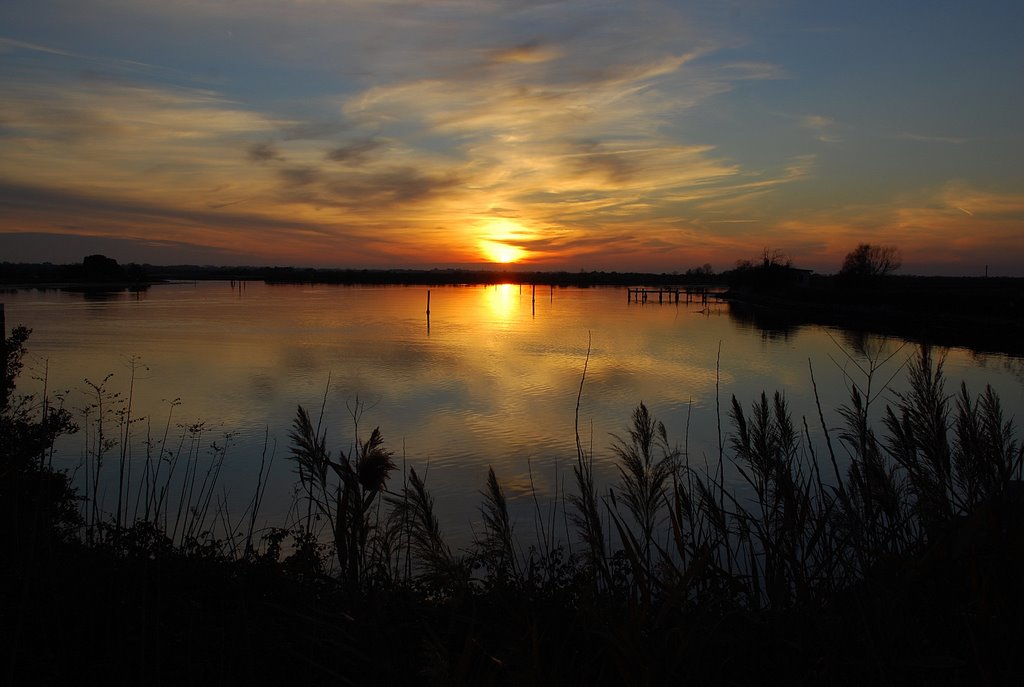 Grado; tramonto sul canale di Primero by giovanni gimona